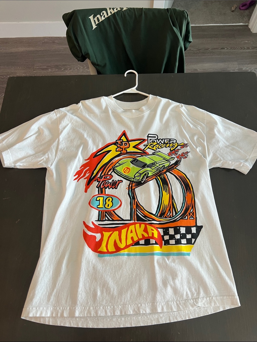 Inaka Power White Tee with Green & Orange Racing Car Graphic